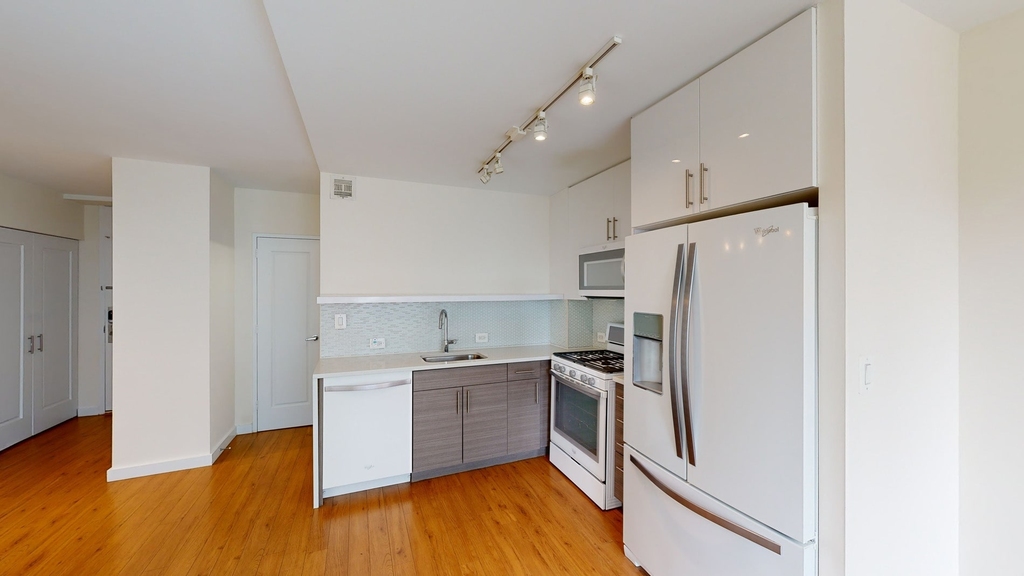 401 E 34th St - Photo 1