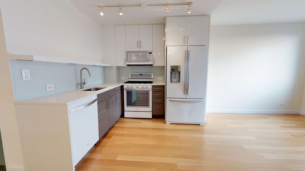 401 E 34th St - Photo 1