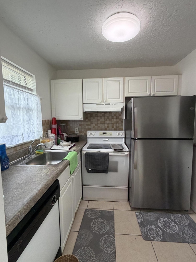 9915 Sandalfoot Boulevard - Photo 3