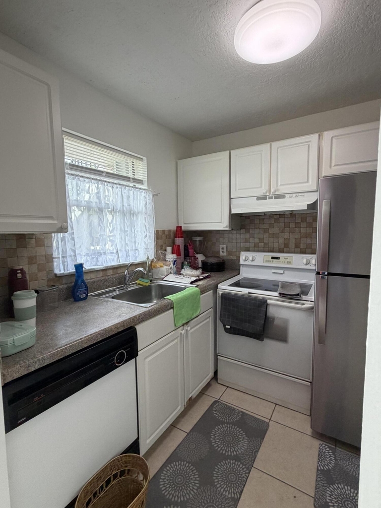 9915 Sandalfoot Boulevard - Photo 5