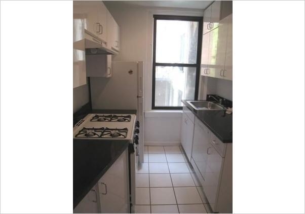 E 37th St - Photo 1