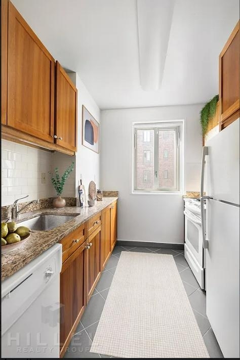 E 20th St. - Photo 0