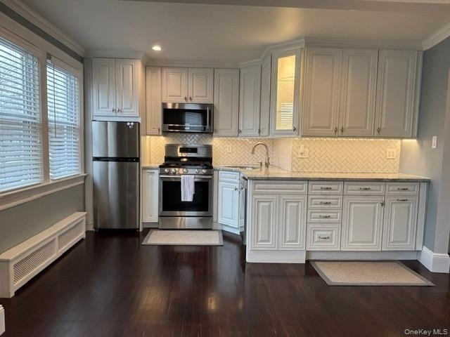 38-23 219th Street - Photo 0