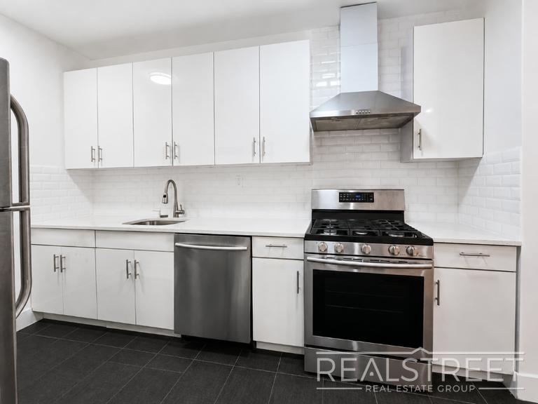 90-02 Queens Blvd - Photo 1