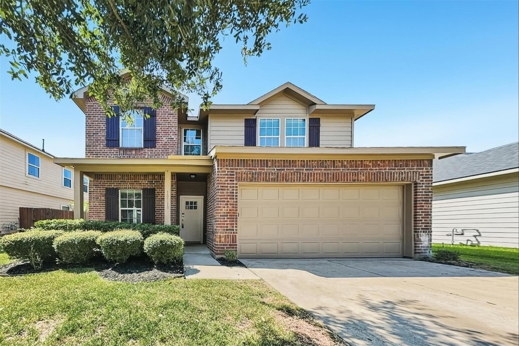 10719 Woodwind Shadows Drive - Photo 0