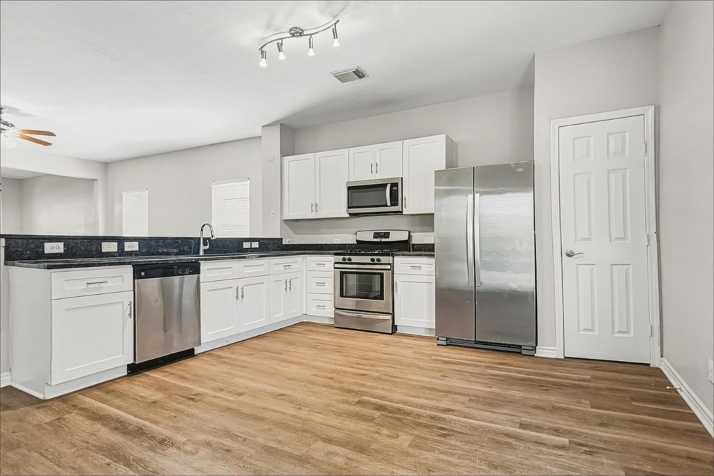 10719 Woodwind Shadows Drive - Photo 2
