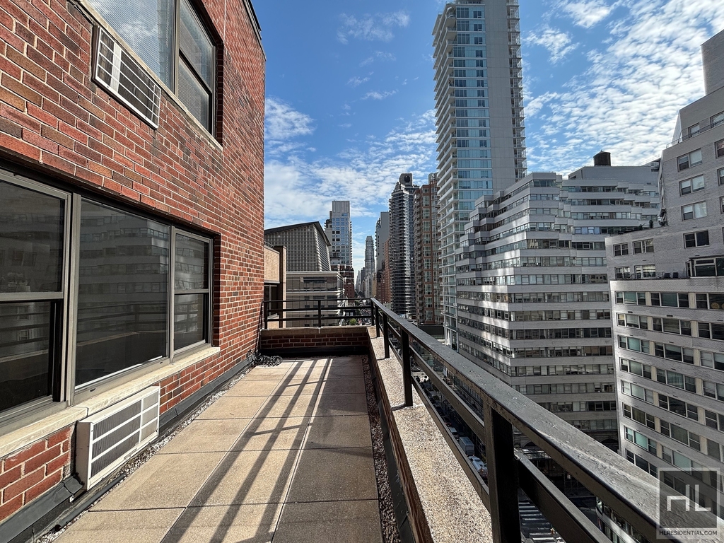 East 57 Street - Photo 0