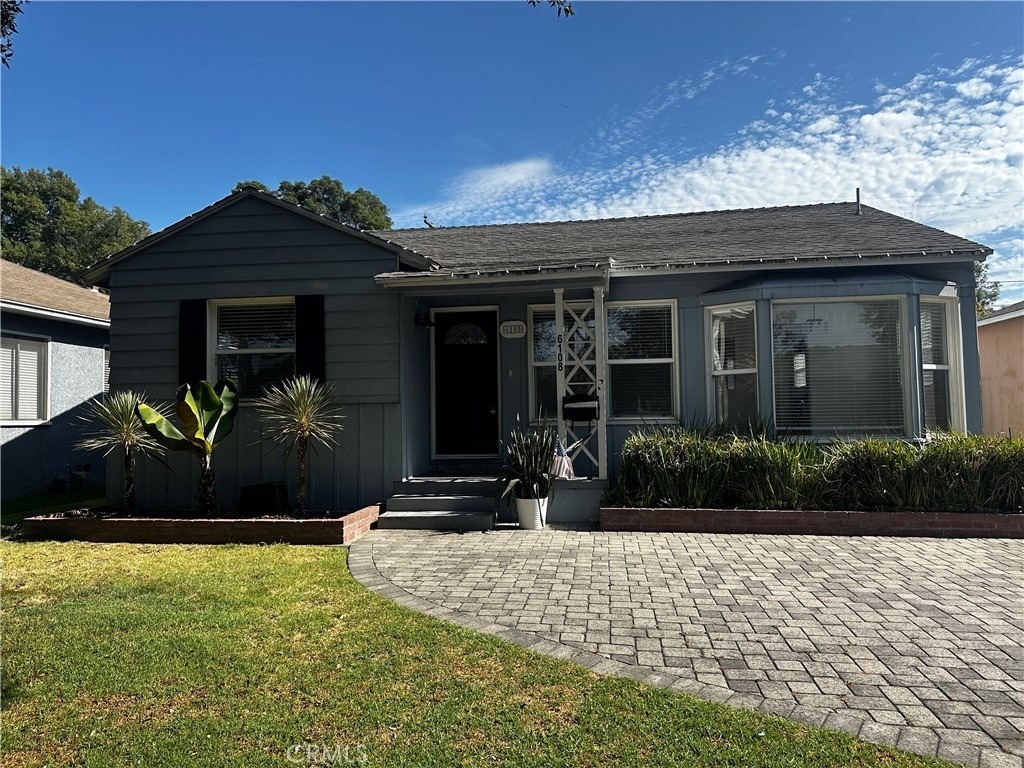 6108 Village Road - Photo 0