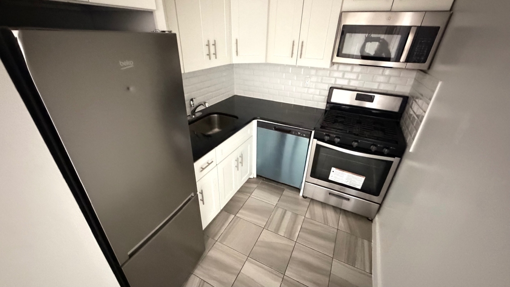 140-16 34th Avenue - Photo 2