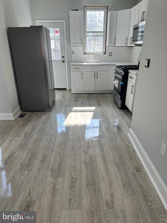 5744 Delancey Street - Photo 4