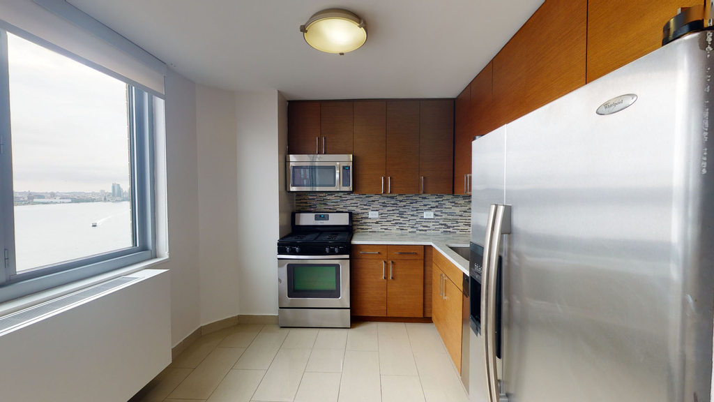 401 E 34th St - Photo 2