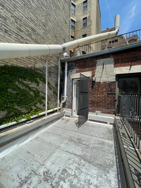 90th between Columbus and Central Park West  - Photo 9