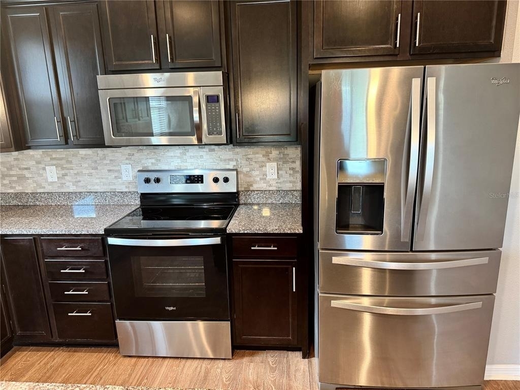 9720 58th Street E - Photo 7