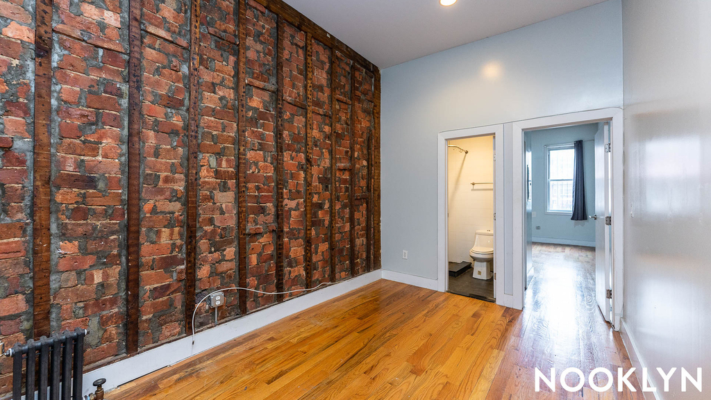 86 Menahan St  11221 - Photo 1