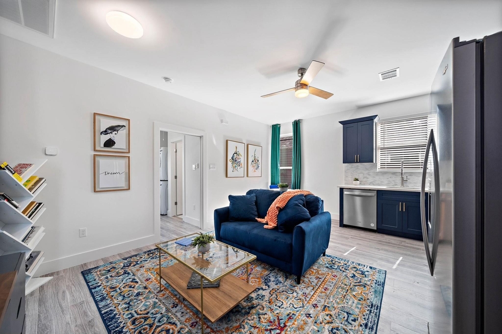 207 E 38th Street E - Photo 0