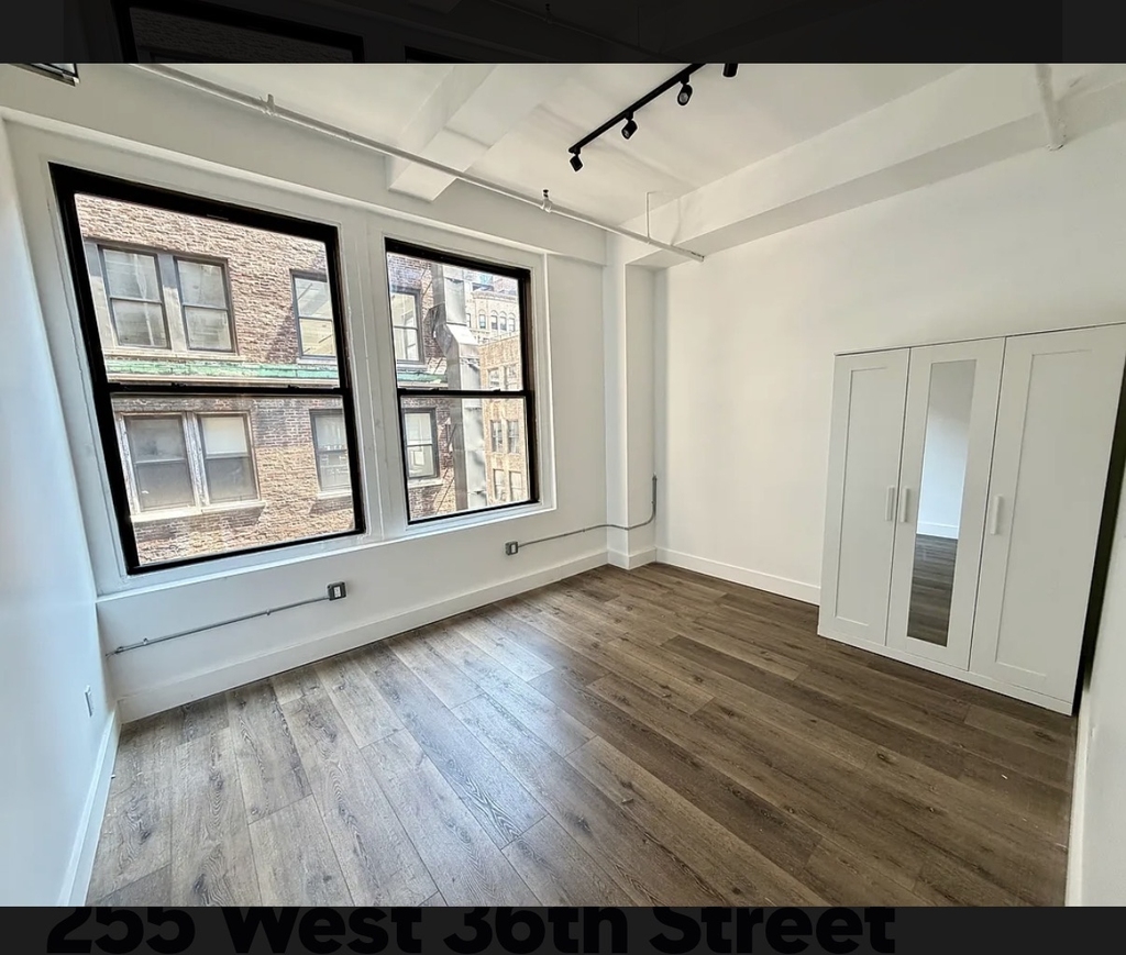 255 W 36th st - Photo 1