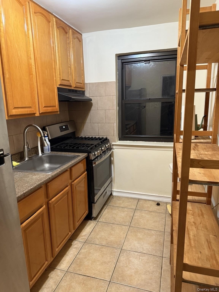 144-46 77th - Photo 0