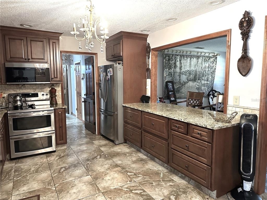 8834 Whispering Oaks Trail - Photo 6