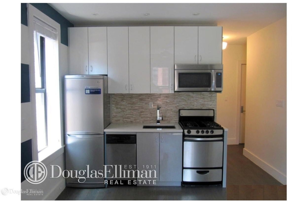 48 W 138th Street - Photo 0