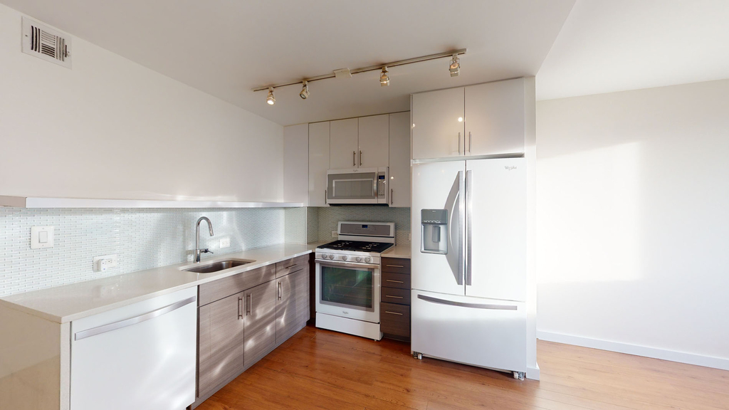 401 E 34th St - Photo 1