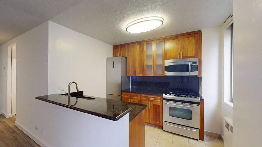 401 E 34th St - Photo 1