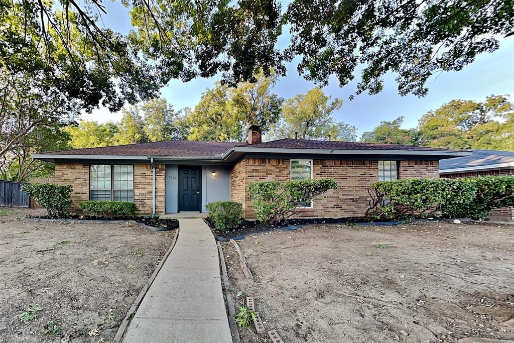 5002 Woodmeadow Drive - Photo 0