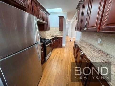 87-16 91st Avenue - Photo 1
