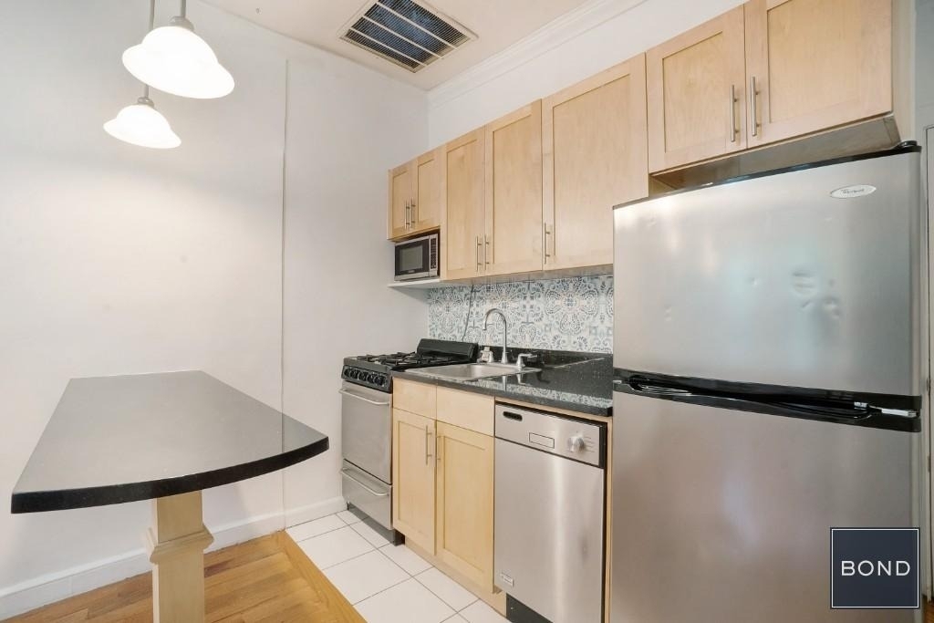 336 E 56th Street - Photo 2