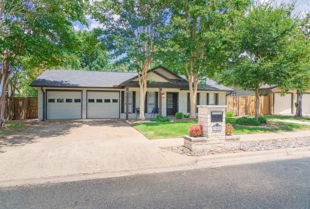 7002 Whispering Oaks Dr - Photo 5