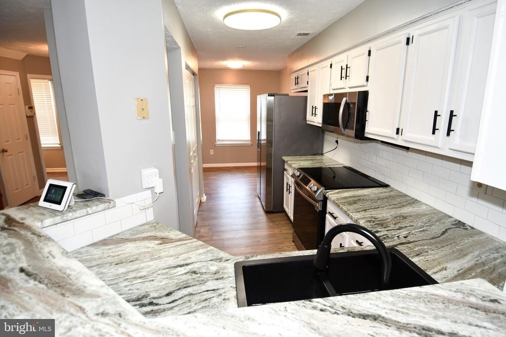 13703 Lord Sterling Place - Photo 10