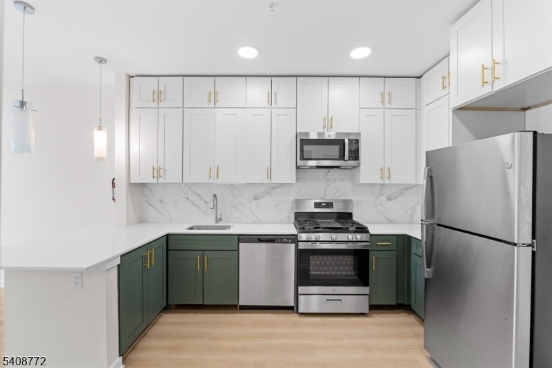 321 E 3rd St - Photo 23