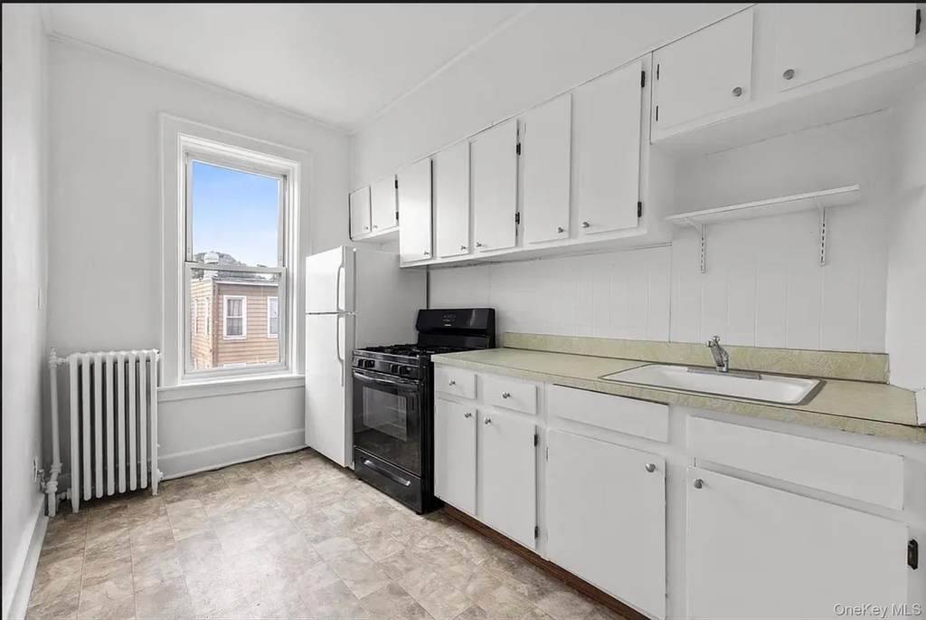 71-52 68th Street - Photo 1