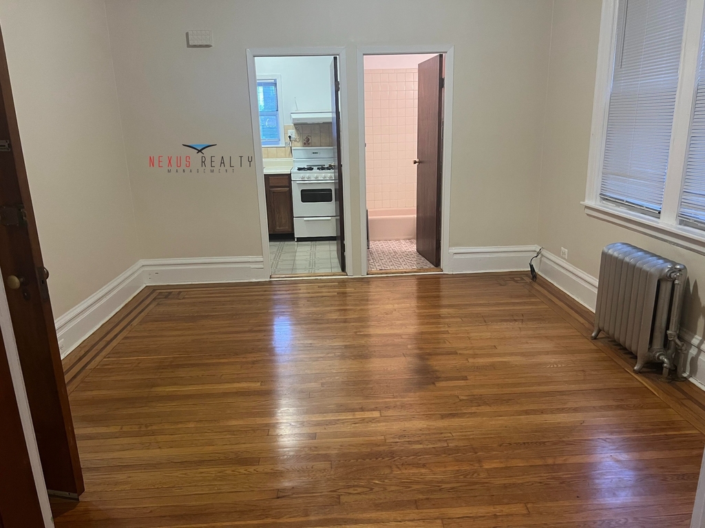 42-12 21st Avenue - Photo 1