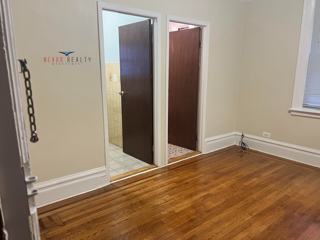42-12 21st Avenue - Photo 2