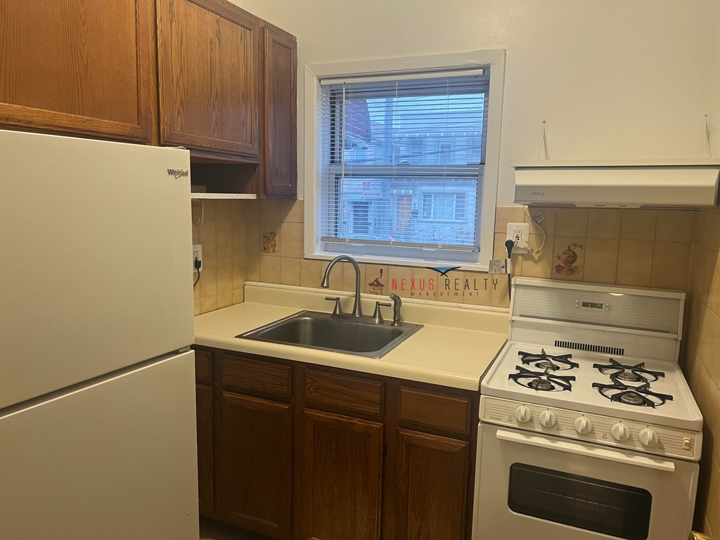 42-12 21st Avenue - Photo 0