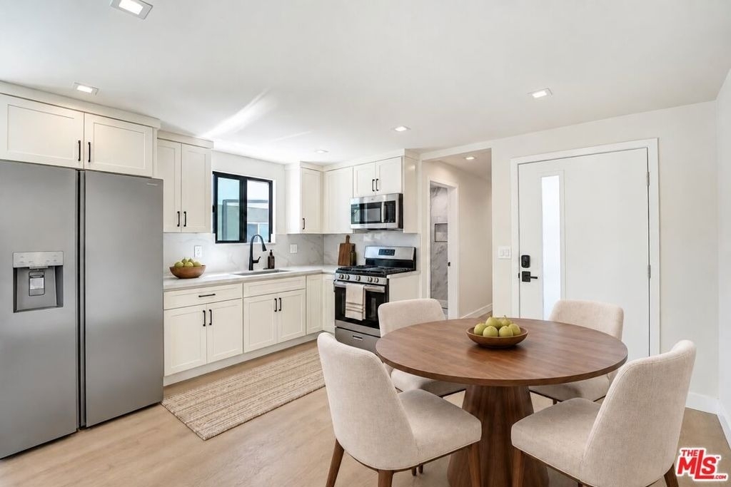 1070 1/2 E Masselin Avenue - Photo 2