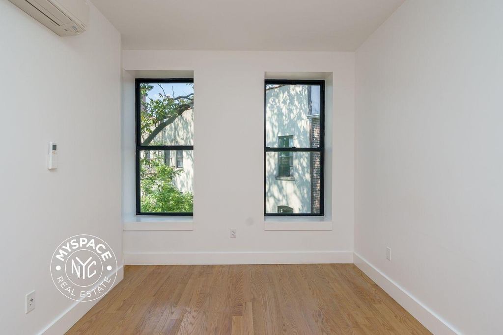 1027 Putnam Ave  - Photo 1