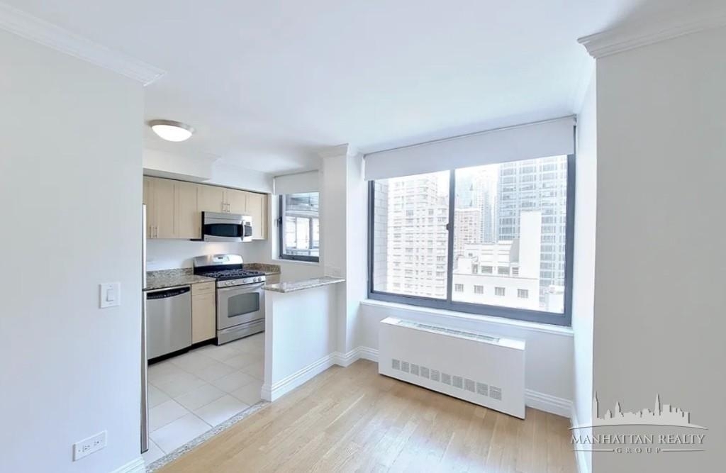 W 48th St - Photo 0