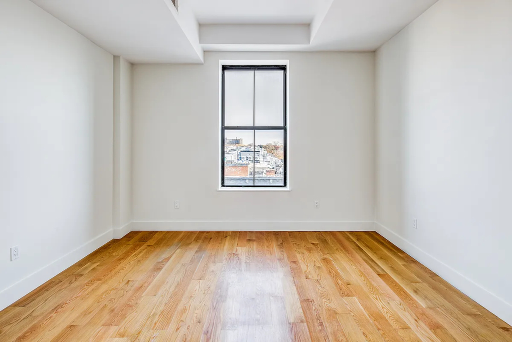 55-27 Myrtle Avenue - Photo 1