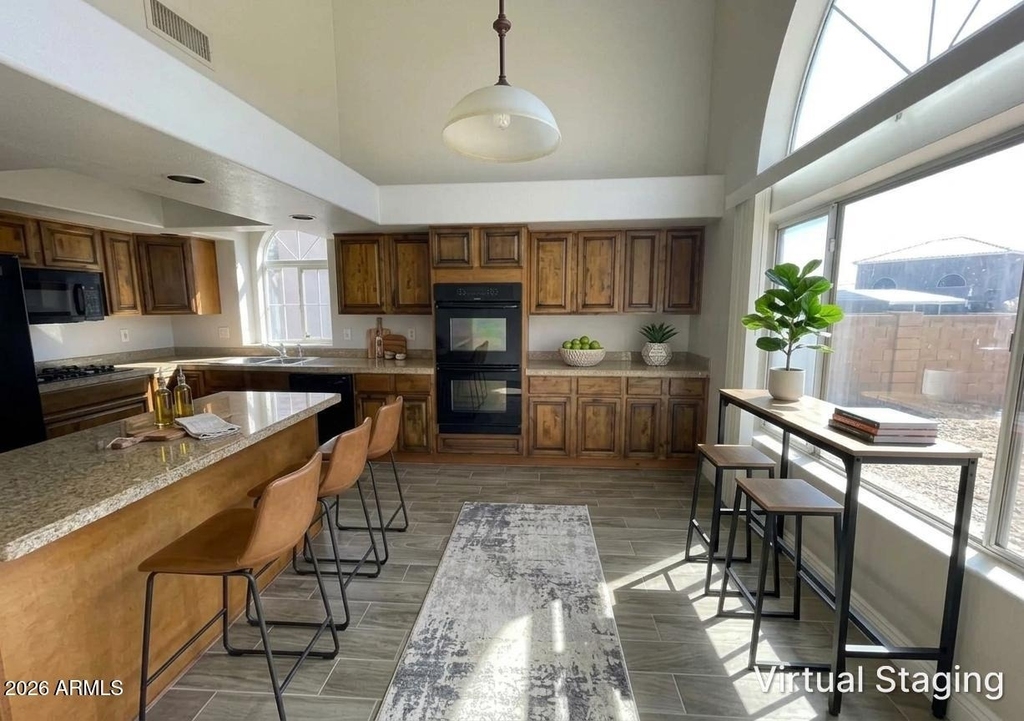 10925 W Kaler Drive - Photo 2