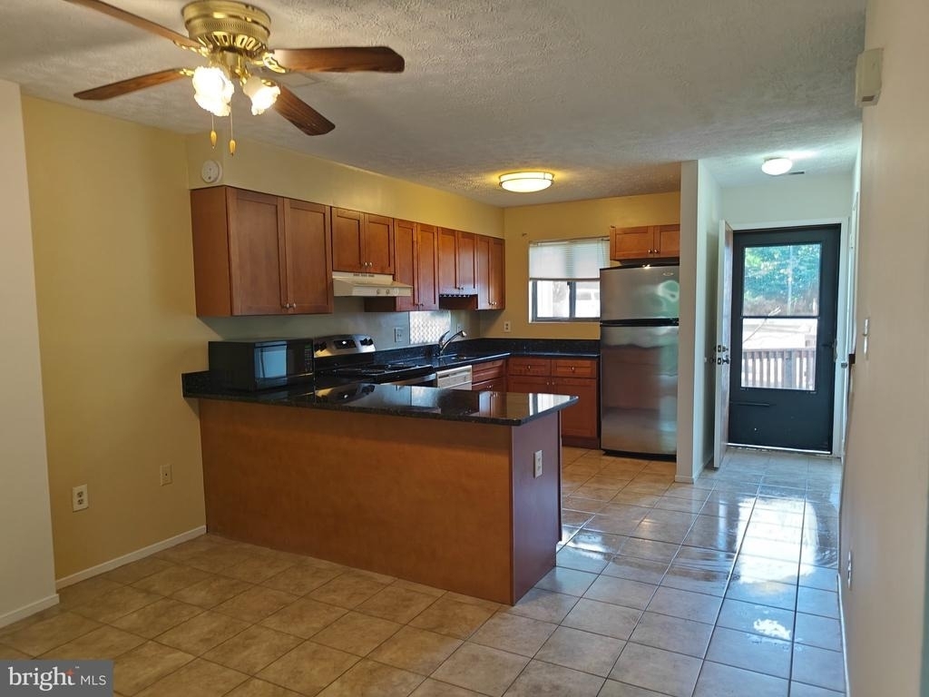 15245 Coachman Terrace - Photo 4