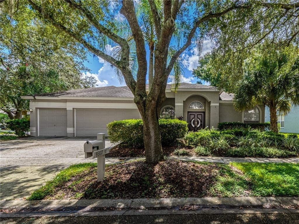 9317 Heritage Oak Court - Photo 0