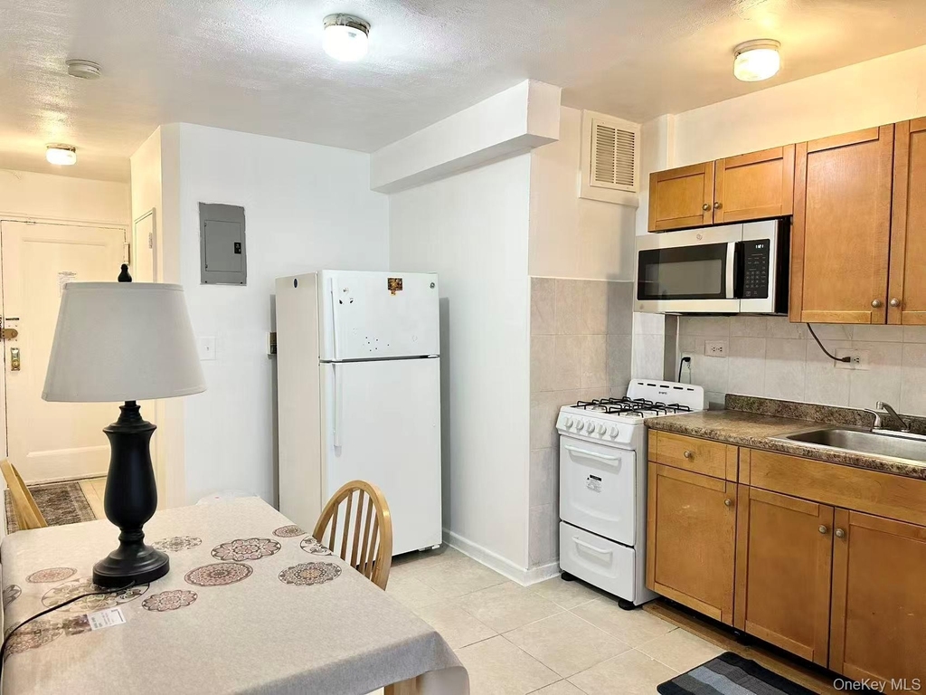144-46 38th Avenue - Photo 2