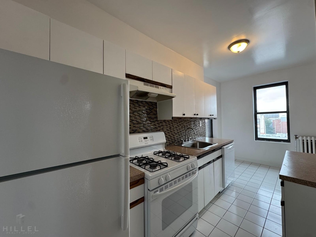 36-14 165th St - Photo 0