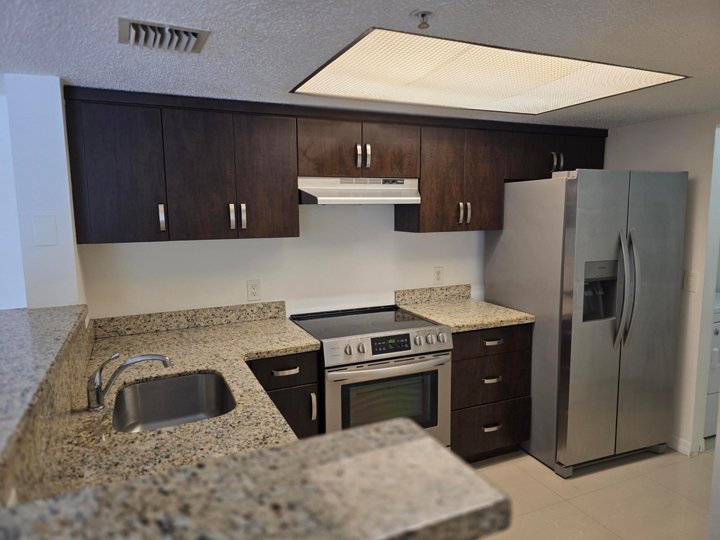 5055 Wiles Road - Photo 2
