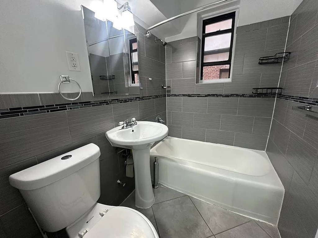 86-11 Whitney Avenue - Photo 1