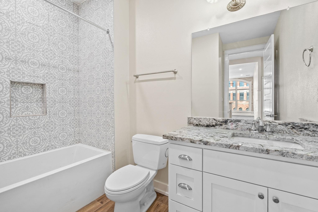 104 E 2nd St - Photo 32