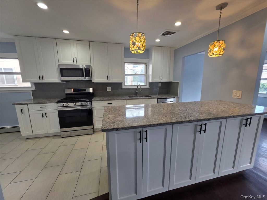 32-23 Plunkett Avenue - Photo 0
