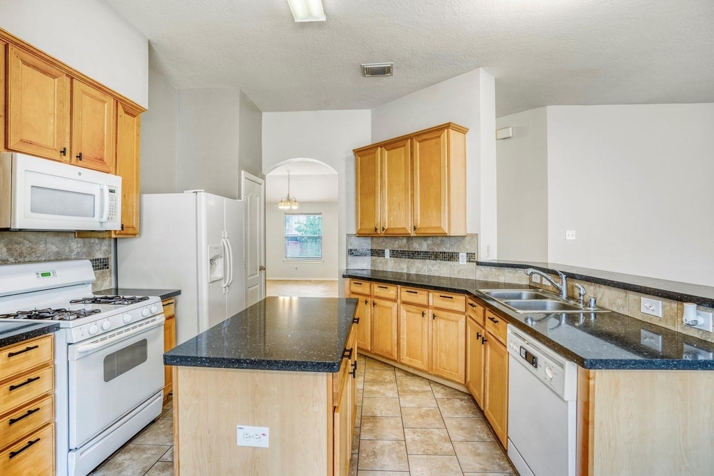 7311 Cragmont Bridge Drive - Photo 9
