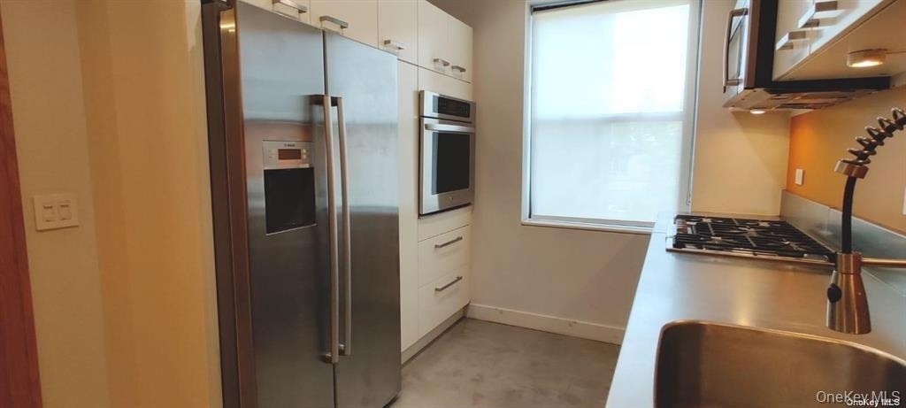 82-16 34th Avenue - Photo 1